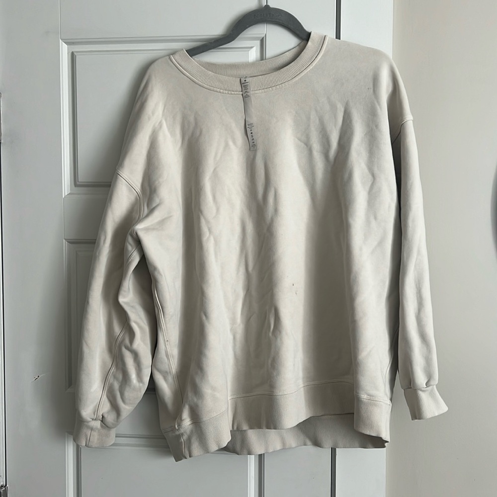 Women’s size M lululemon pullover in cream! Slight stains but would come out